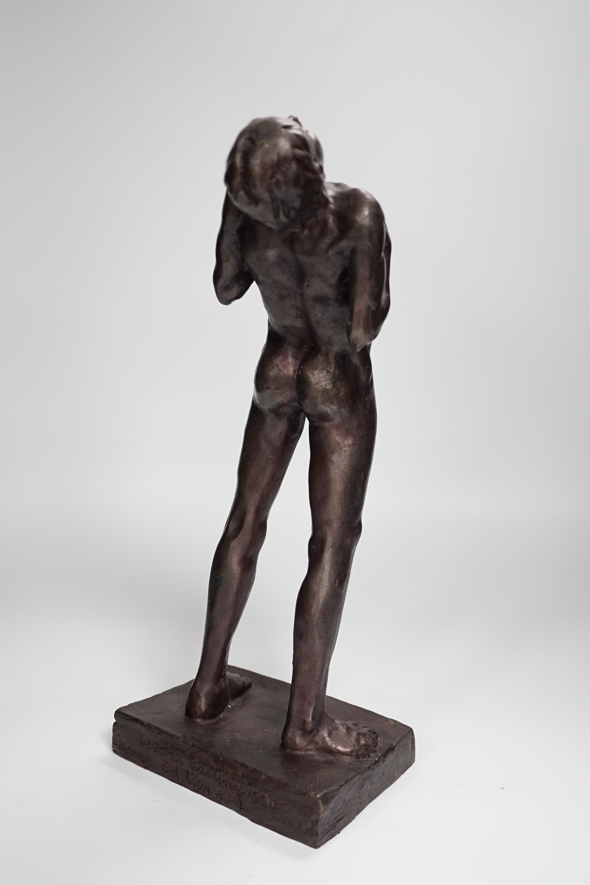 A bronze of a standing male nude, 36cm high